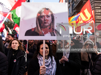 People and various associations participate in a national pro-Palestine demonstration in Rome, Italy, on November 30, 2024, against the geno...