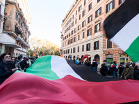 People and various associations participate in a national pro-Palestine demonstration in Rome, Italy, on November 30, 2024, against the geno...