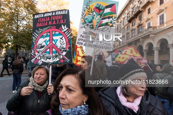 People and various associations participate in a national pro-Palestine demonstration in Rome, Italy, on November 30, 2024, against the geno...