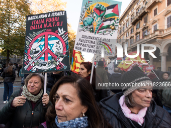 People and various associations participate in a national pro-Palestine demonstration in Rome, Italy, on November 30, 2024, against the geno...