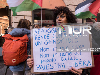 People and various associations participate in a national pro-Palestine demonstration in Rome, Italy, on November 30, 2024, against the geno...