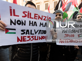 People and various associations participate in a national pro-Palestine demonstration in Rome, Italy, on November 30, 2024, against the geno...