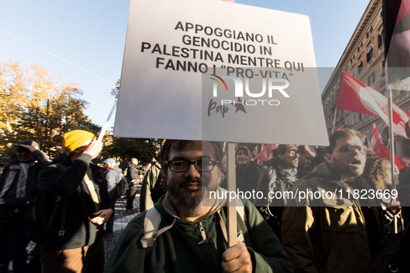 People and various associations participate in a national pro-Palestine demonstration in Rome, Italy, on November 30, 2024, against the geno...