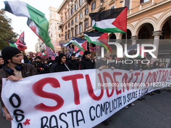 People and various associations participate in a national pro-Palestine demonstration in Rome, Italy, on November 30, 2024, against the geno...