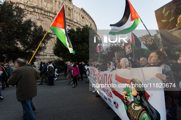 People and various associations participate in a national pro-Palestine demonstration in Rome, Italy, on November 30, 2024, against the geno...