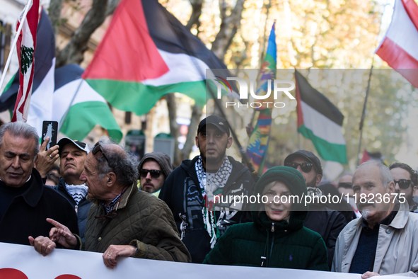 People and various associations participate in a national pro-Palestine demonstration in Rome, Italy, on November 30, 2024, against the geno...