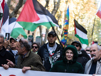 People and various associations participate in a national pro-Palestine demonstration in Rome, Italy, on November 30, 2024, against the geno...