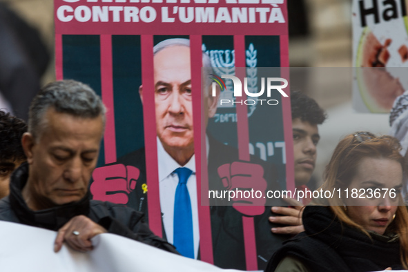 People and various associations participate in a national pro-Palestine demonstration in Rome, Italy, on November 30, 2024, against the geno...