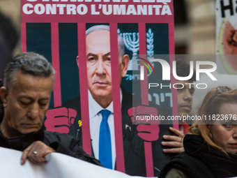 People and various associations participate in a national pro-Palestine demonstration in Rome, Italy, on November 30, 2024, against the geno...