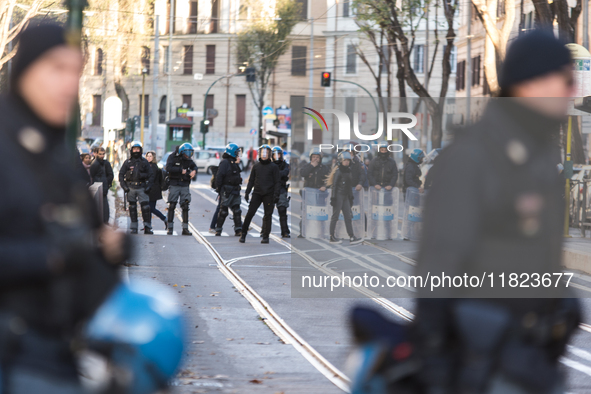 People and various associations participate in a national pro-Palestine demonstration in Rome, Italy, on November 30, 2024, against the geno...