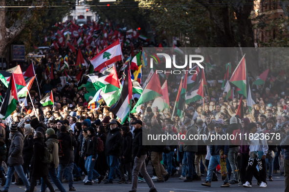 People and various associations participate in a national pro-Palestine demonstration in Rome, Italy, on November 30, 2024, against the geno...