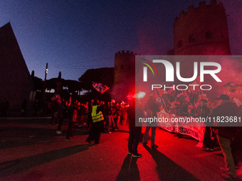 People and various associations participate in a national pro-Palestine demonstration in Rome, Italy, on November 30, 2024, against the geno...