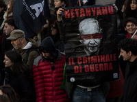 People and various associations participate in a national pro-Palestine demonstration in Rome, Italy, on November 30, 2024, against the geno...