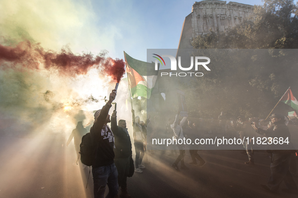 People and various associations participate in a national pro-Palestine demonstration in Rome, Italy, on November 30, 2024, against the geno...