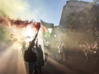 People and various associations participate in a national pro-Palestine demonstration in Rome, Italy, on November 30, 2024, against the geno...