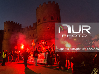 People and various associations participate in a national pro-Palestine demonstration in Rome, Italy, on November 30, 2024, against the geno...