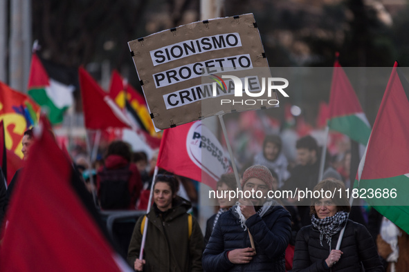 People and various associations participate in a national pro-Palestine demonstration in Rome, Italy, on November 30, 2024, against the geno...