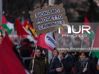 People and various associations participate in a national pro-Palestine demonstration in Rome, Italy, on November 30, 2024, against the geno...