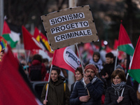 People and various associations participate in a national pro-Palestine demonstration in Rome, Italy, on November 30, 2024, against the geno...