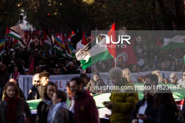 People and various associations participate in a national pro-Palestine demonstration in Rome, Italy, on November 30, 2024, against the geno...