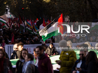 People and various associations participate in a national pro-Palestine demonstration in Rome, Italy, on November 30, 2024, against the geno...