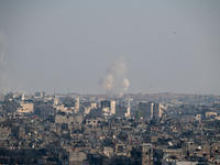 Thick columns of smoke were seen rising over the city of Aleppo on November 30, 2024, following a series of airstrikes conducted by Syrian w...