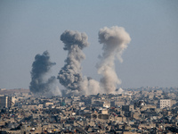 Thick columns of smoke were seen rising over the city of Aleppo on November 30, 2024, following a series of airstrikes conducted by Syrian w...