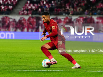 Benjamin Henrichs of RB Leipzig  controls the ball during the Bundesliga match between RB Leipzig and VfL Wolfsburg at Red Bull Arena, Leipz...