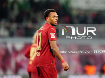 Lois Openda of RB Leipzig  controls the ball during the Bundesliga match between RB Leipzig and VfL Wolfsburg at Red Bull Arena, Leipzig, Ge...