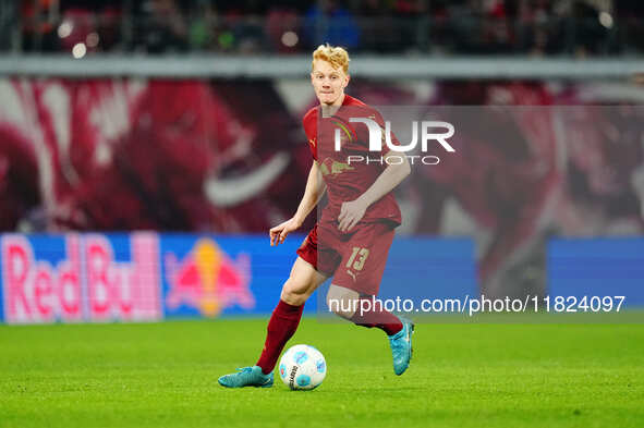 Nicolas Seiwald of RB Leipzig  controls the ball during the Bundesliga match between RB Leipzig and VfL Wolfsburg at Red Bull Arena, Leipzig...