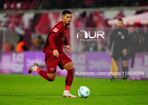 Benjamin Henrichs of RB Leipzig  controls the ball during the Bundesliga match between RB Leipzig and VfL Wolfsburg at Red Bull Arena, Leipz...