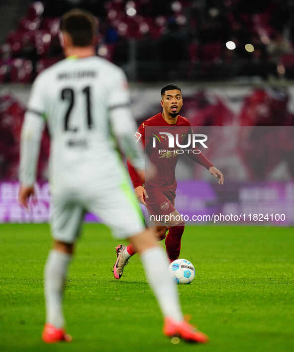 Benjamin Henrichs of RB Leipzig  controls the ball during the Bundesliga match between RB Leipzig and VfL Wolfsburg at Red Bull Arena, Leipz...