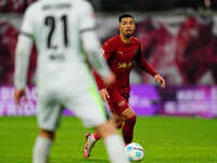 Benjamin Henrichs of RB Leipzig  controls the ball during the Bundesliga match between RB Leipzig and VfL Wolfsburg at Red Bull Arena, Leipz...