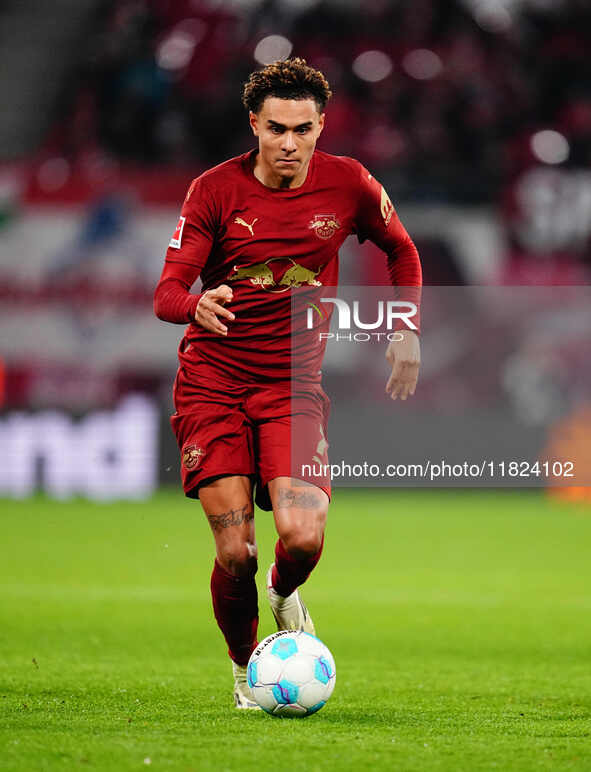 Antonio Nusa of RB Leipzig  controls the ball during the Bundesliga match between RB Leipzig and VfL Wolfsburg at Red Bull Arena, Leipzig, G...