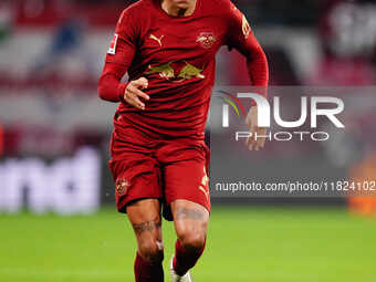 Antonio Nusa of RB Leipzig  controls the ball during the Bundesliga match between RB Leipzig and VfL Wolfsburg at Red Bull Arena, Leipzig, G...