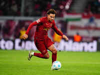 Antonio Nusa of RB Leipzig  controls the ball during the Bundesliga match between RB Leipzig and VfL Wolfsburg at Red Bull Arena, Leipzig, G...