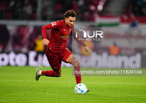 Antonio Nusa of RB Leipzig  controls the ball during the Bundesliga match between RB Leipzig and VfL Wolfsburg at Red Bull Arena, Leipzig, G...