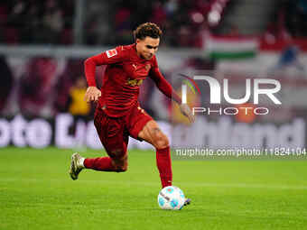 Antonio Nusa of RB Leipzig  controls the ball during the Bundesliga match between RB Leipzig and VfL Wolfsburg at Red Bull Arena, Leipzig, G...