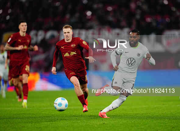 Ridle Baku of VfL Wolfsburg  controls the ball during the Bundesliga match between RB Leipzig and VfL Wolfsburg at Red Bull Arena, Leipzig,...