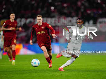 Ridle Baku of VfL Wolfsburg  controls the ball during the Bundesliga match between RB Leipzig and VfL Wolfsburg at Red Bull Arena, Leipzig,...