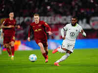 Ridle Baku of VfL Wolfsburg  controls the ball during the Bundesliga match between RB Leipzig and VfL Wolfsburg at Red Bull Arena, Leipzig,...