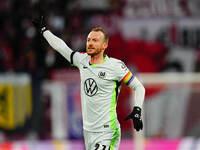 Maximilian Arnold of VfL Wolfsburg  gestures during the Bundesliga match between RB Leipzig and VfL Wolfsburg at Red Bull Arena, Leipzig, Ge...