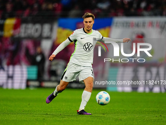 Kilian Fischer of VfL Wolfsburg  controls the ball during the Bundesliga match between RB Leipzig and VfL Wolfsburg at Red Bull Arena, Leipz...