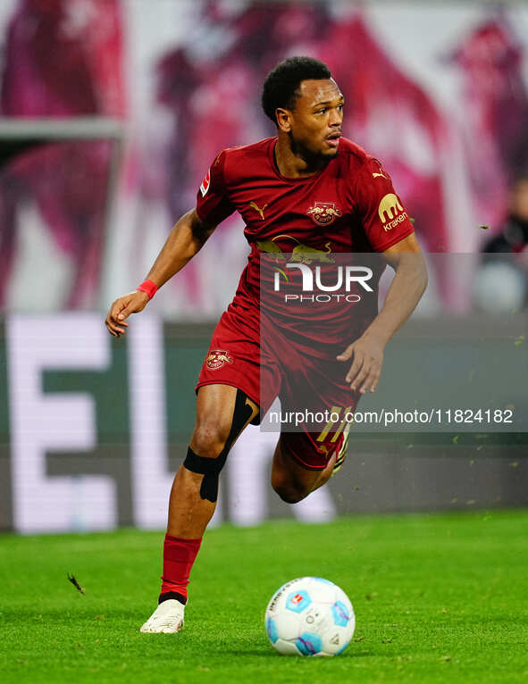 Lois Openda of RB Leipzig  controls the ball during the Bundesliga match between RB Leipzig and VfL Wolfsburg at Red Bull Arena, Leipzig, Ge...