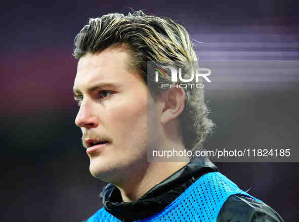 Jonas Wind of VfL Wolfsburg  looks on during the Bundesliga match between RB Leipzig and VfL Wolfsburg at Red Bull Arena, Leipzig, Germany o...