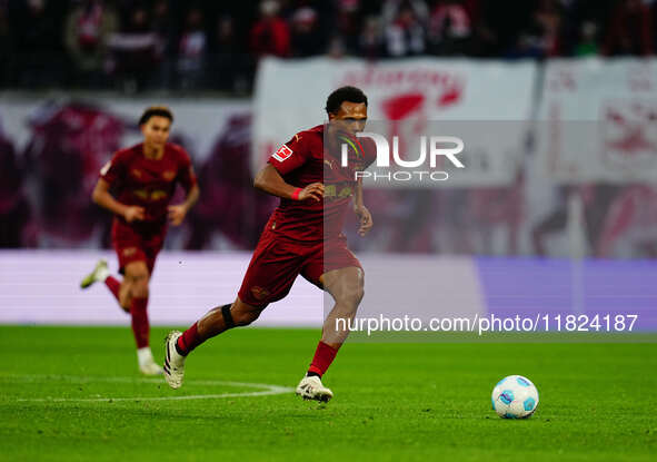 Lois Openda of RB Leipzig  controls the ball during the Bundesliga match between RB Leipzig and VfL Wolfsburg at Red Bull Arena, Leipzig, Ge...