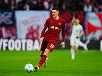 Benjamin Sesko of RB Leipzig  controls the ball during the Bundesliga match between RB Leipzig and VfL Wolfsburg at Red Bull Arena, Leipzig,...