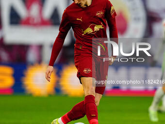 Benjamin Sesko of RB Leipzig  controls the ball during the Bundesliga match between RB Leipzig and VfL Wolfsburg at Red Bull Arena, Leipzig,...