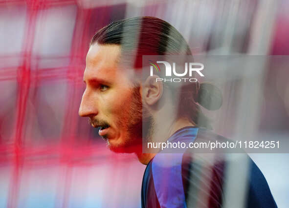 Kamil Grabara of VfL Wolfsburg  looks on during the Bundesliga match between RB Leipzig and VfL Wolfsburg at Red Bull Arena, Leipzig, German...