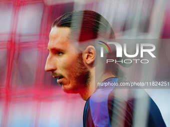 Kamil Grabara of VfL Wolfsburg  looks on during the Bundesliga match between RB Leipzig and VfL Wolfsburg at Red Bull Arena, Leipzig, German...